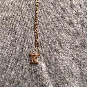 Gold “K” necklace